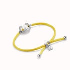 Yellow cord bracelet with a pearl
